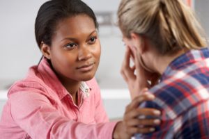 woman speaking with a therapist