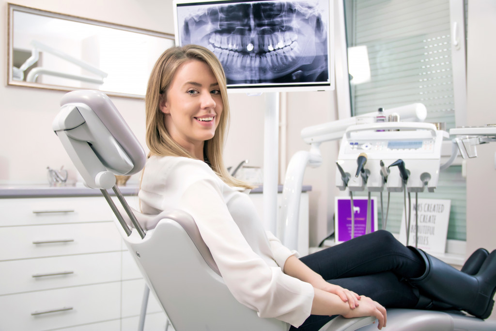 a woman in a dental appointement