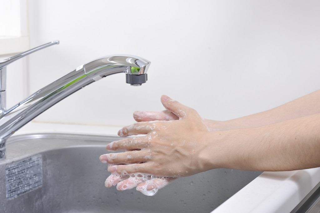 washing hands with water and soap 