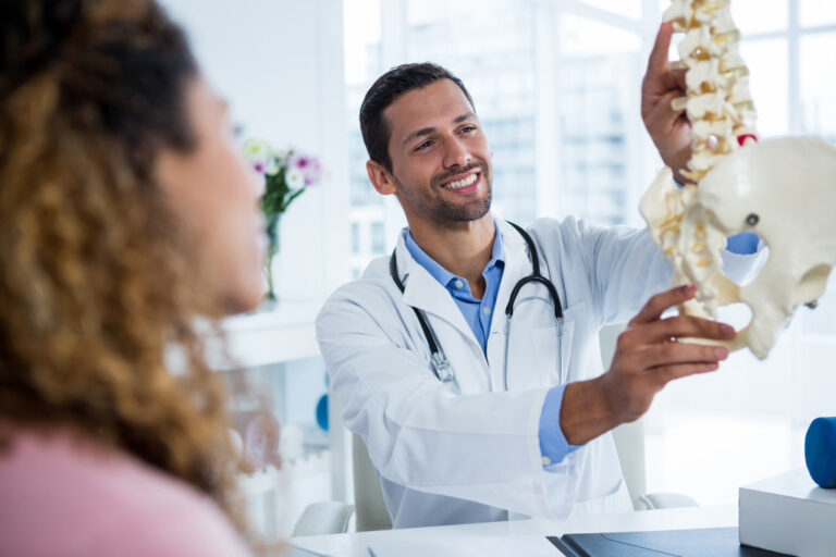 a healthcare provider talking to patient