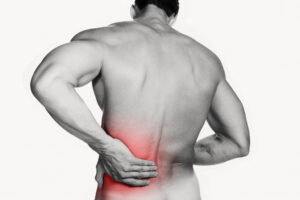 muscular man with lower back pain