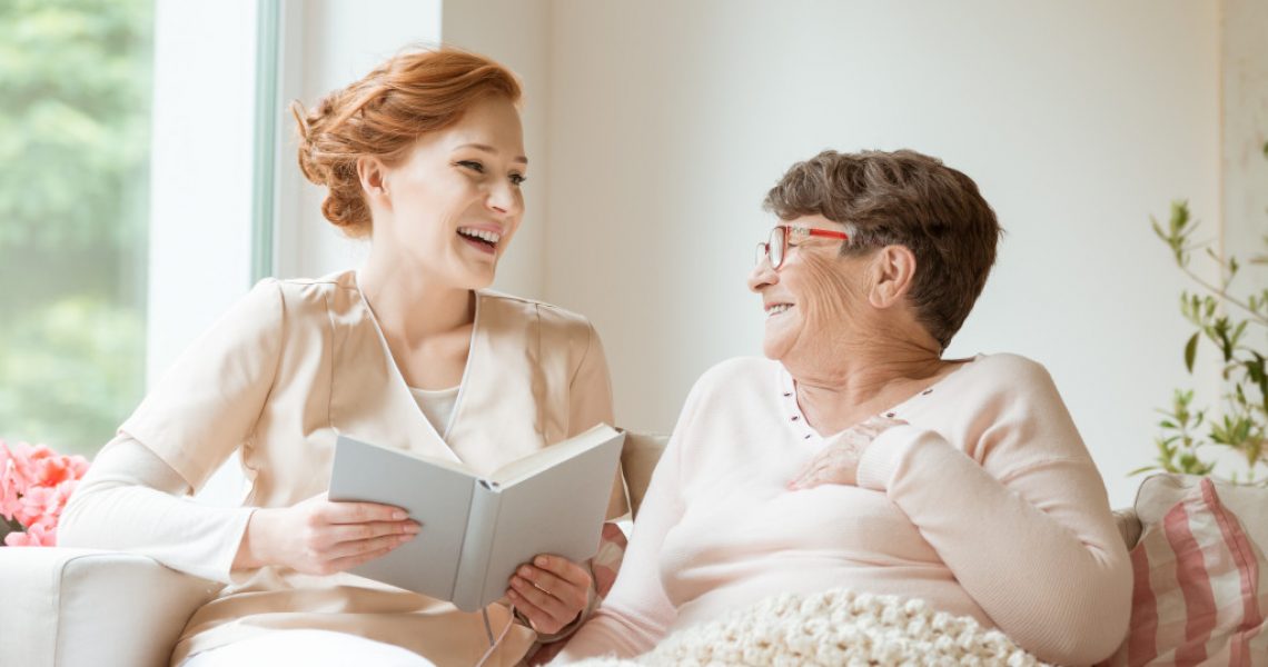 woman telling a story to an elderly woman