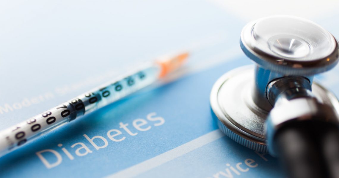 A diabetes test, a stethoscope, and a syringe